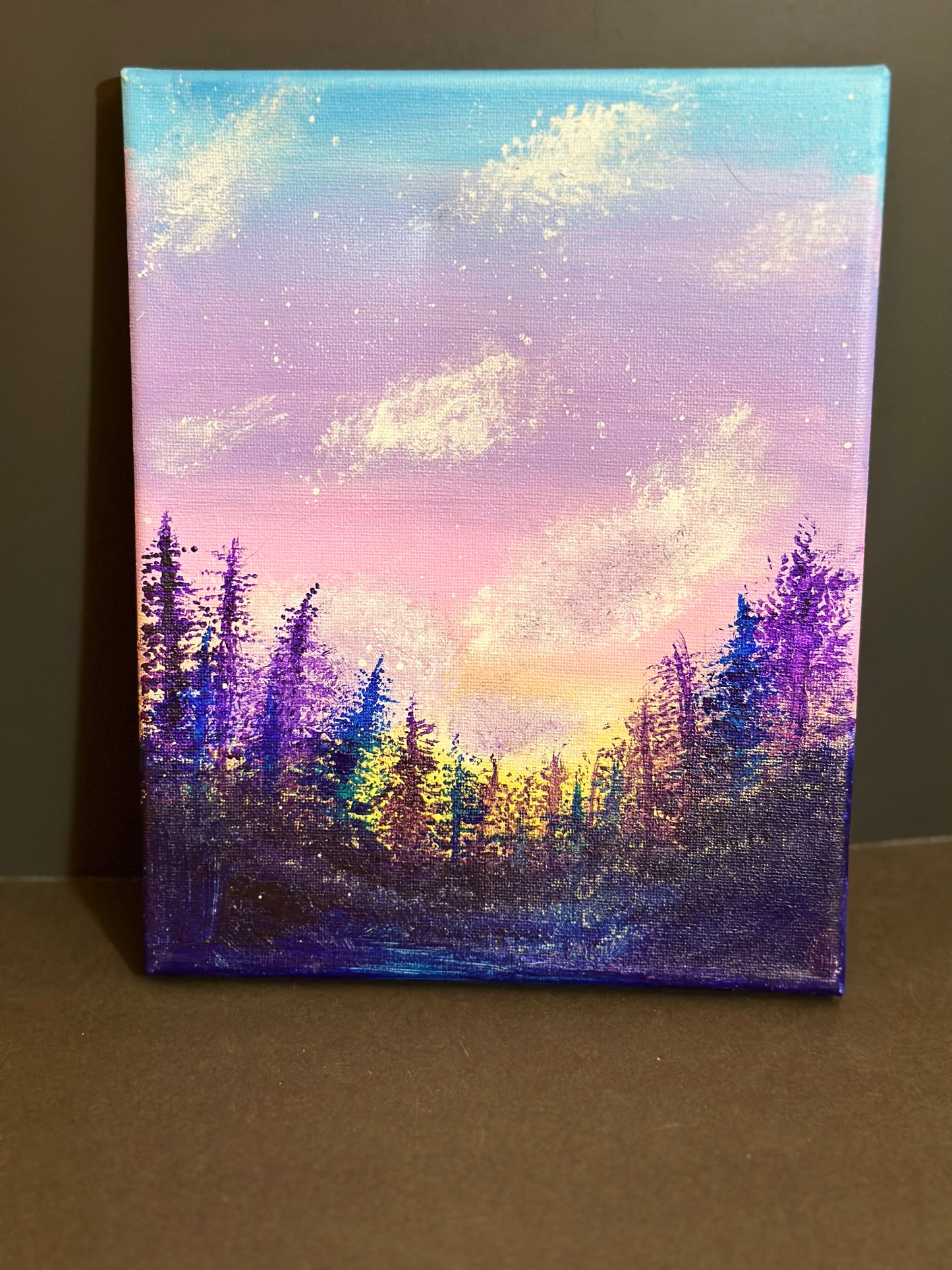 Pine tree and sky painting